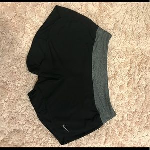 Nike shorts black with gray belt area!